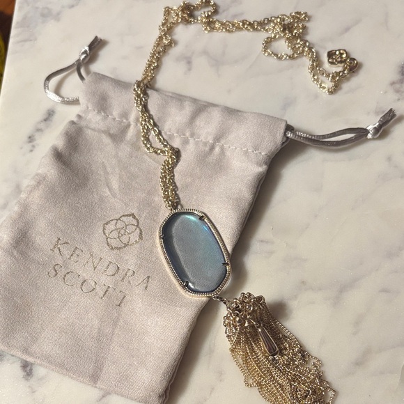 Kendra Scott Jewelry - Kendra Scott Rayne necklace with gold chain and an iridescent stone with tassel